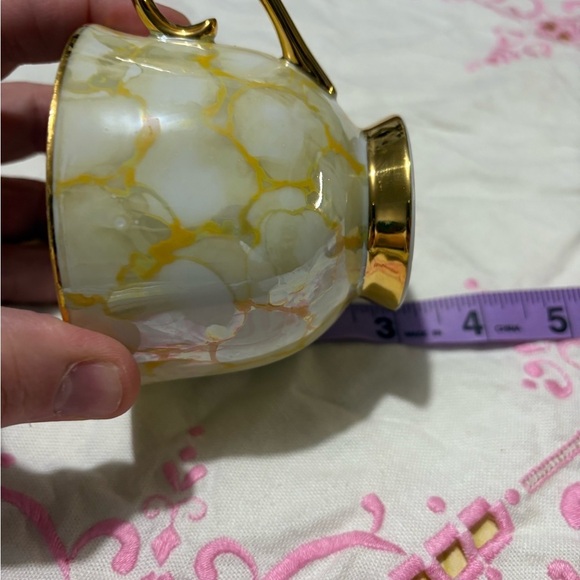 Vintage Gold and White Teacup and Saucer Set with Luxurious Design - Picture 10 of 10